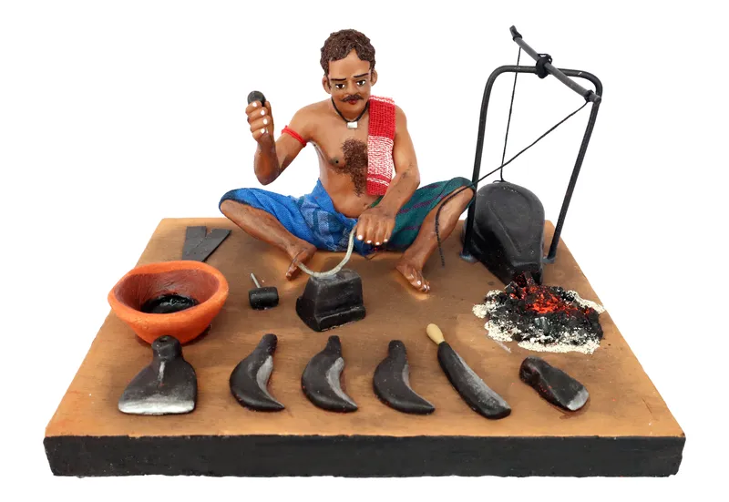 Blacksmith - Handmade Terracotta Clay Figurine | Prime Sitting Human Figure Idol