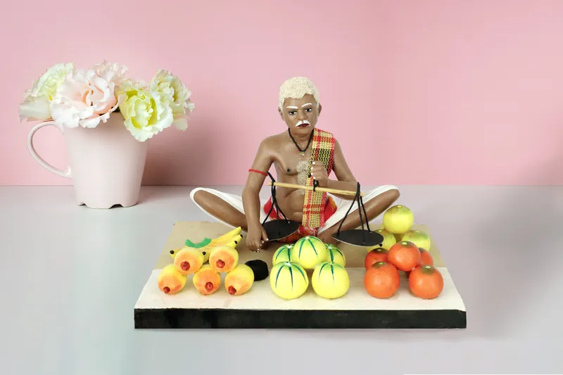 Fruit Seller - Handmade Terracotta Clay Figurine | Standard Sitting Human Figure Idol