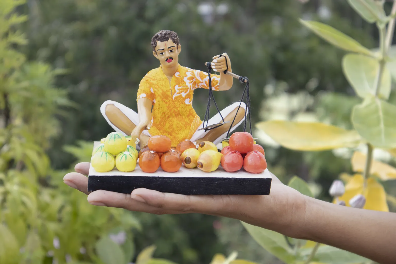 Fruit Seller - Handmade Terracotta Clay Figurine | Basic Sitting Human Figure Idol