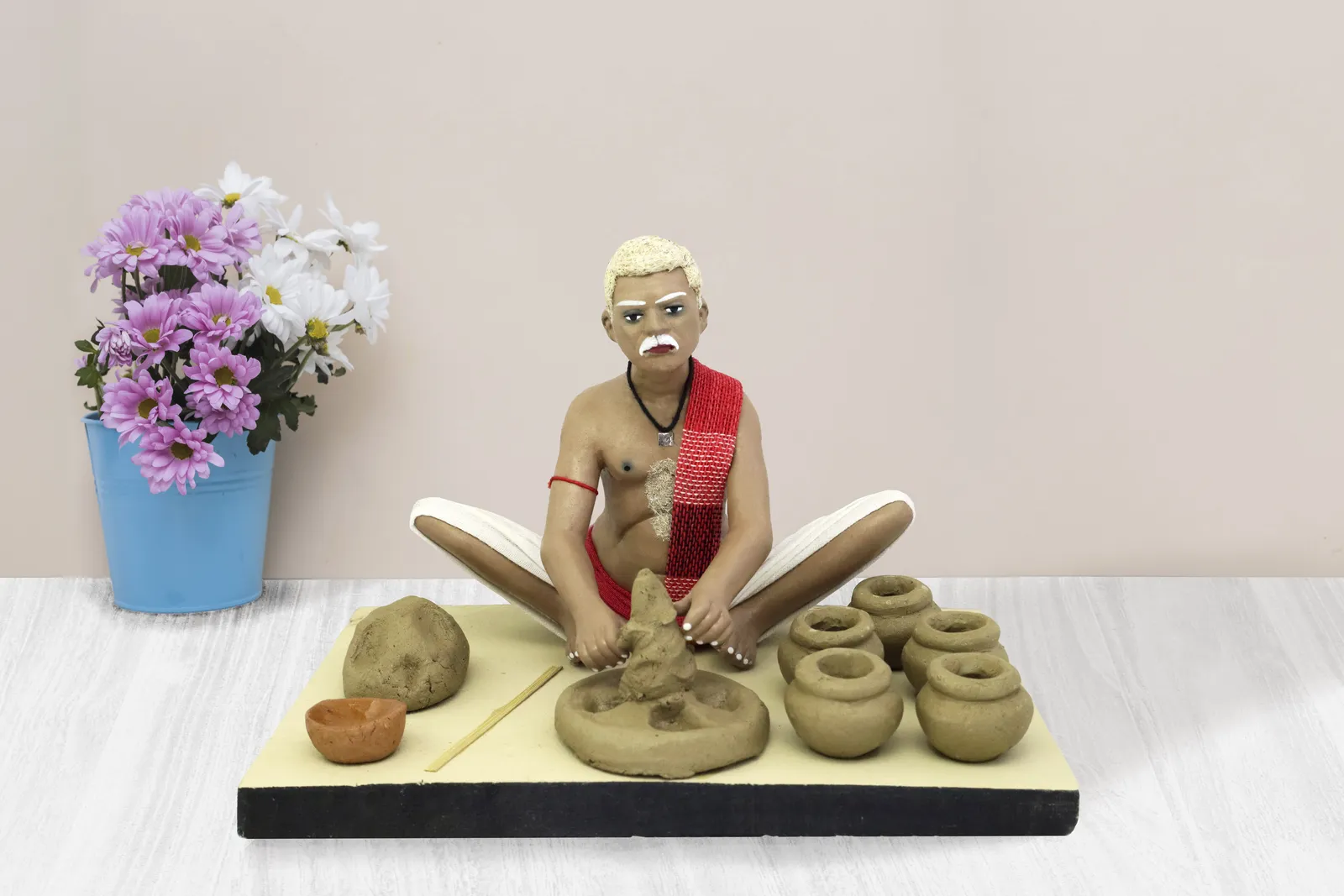 Potter - Handmade Terracotta Clay Figurine | Standard Sitting Human Figure Idol
