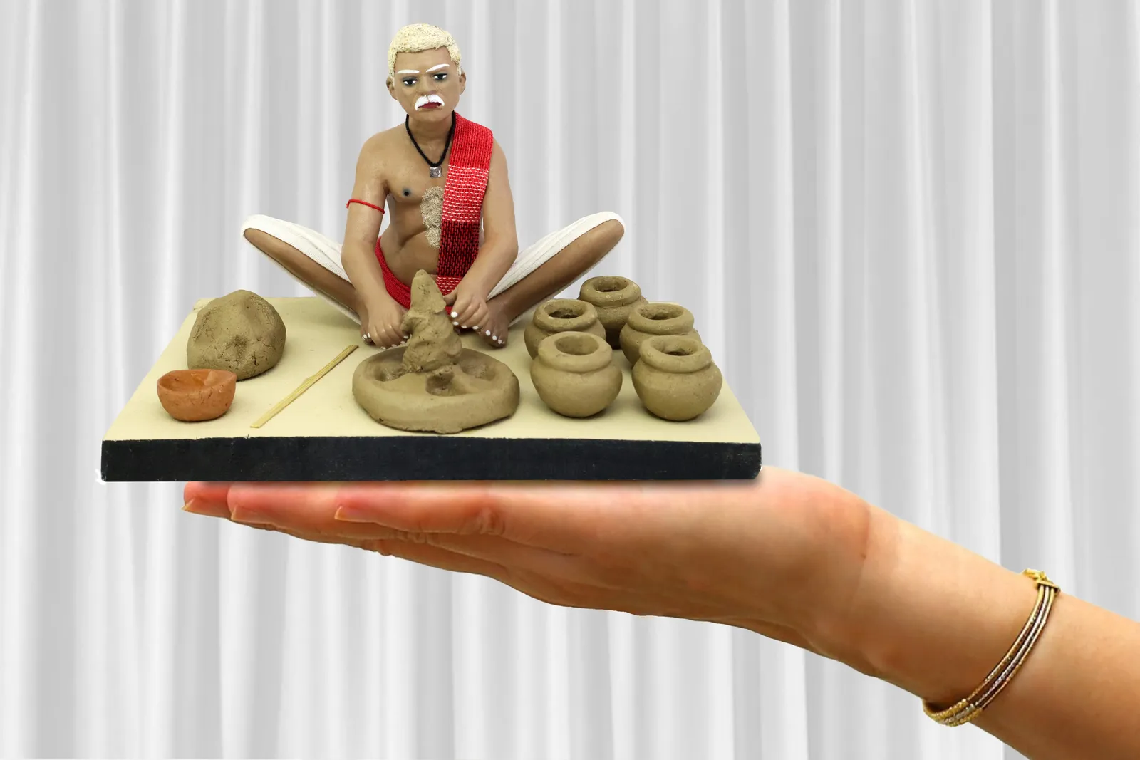 Potter - Handmade Terracotta Clay Figurine | Standard Sitting Human Figure Idol