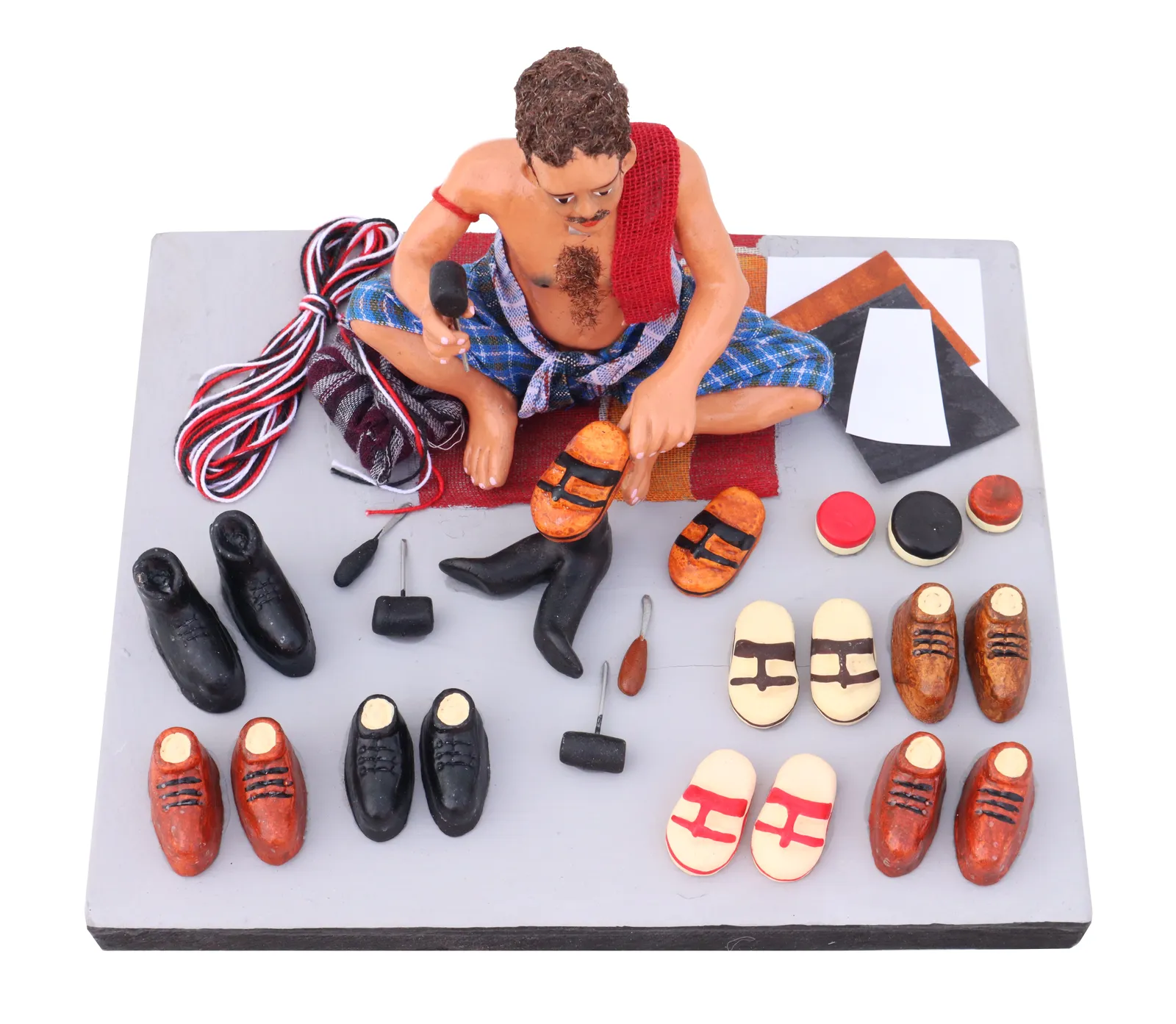 Shoemaker - Handmade Terracotta Clay Figurine | Prime Sitting Human Figure Idol